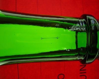 Sistema de control de defectos en el cuello de botellas de vidrio. [Glass bottles faults control system].